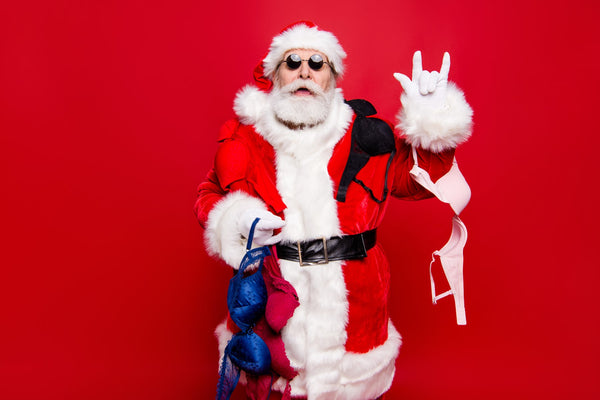Bad Santa holding bras | OneNightOnly