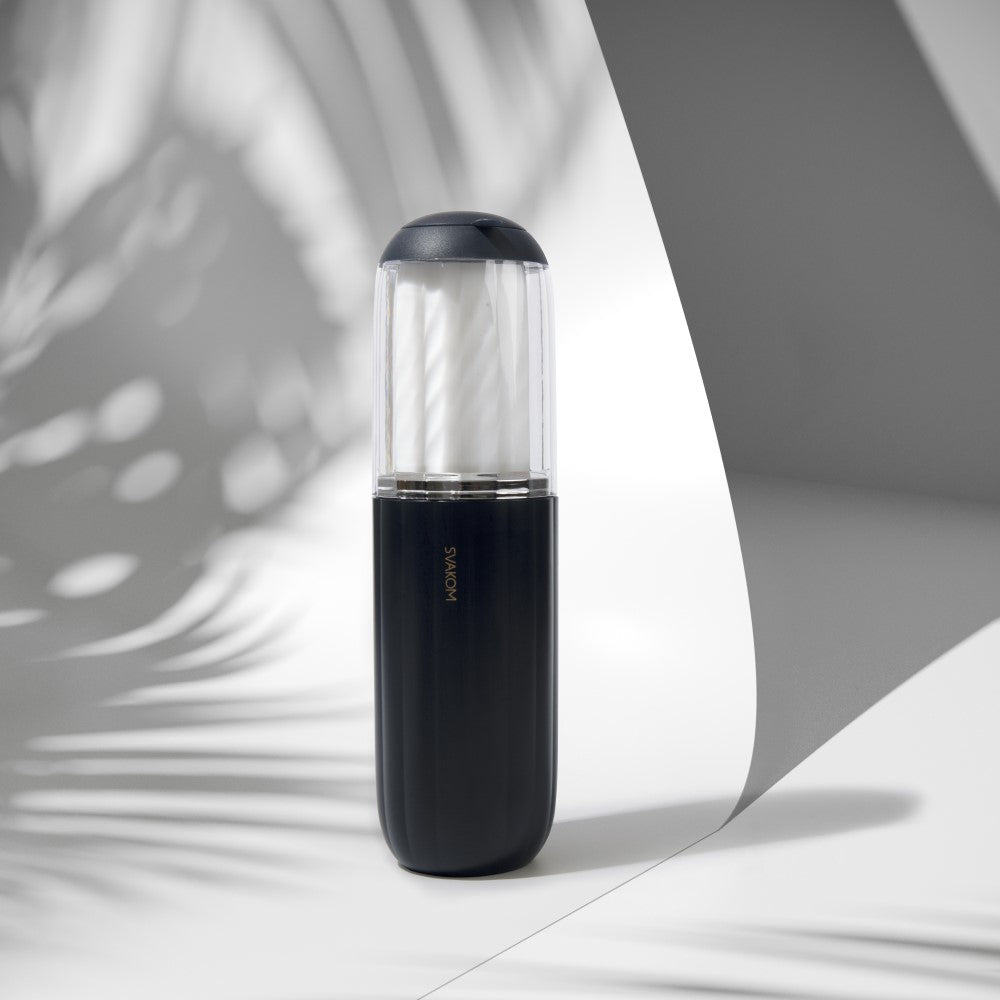 Alex Neo 2 Interactive Thrusting Masturbator | Svakom (Dark Blue) on white curve backdrop
