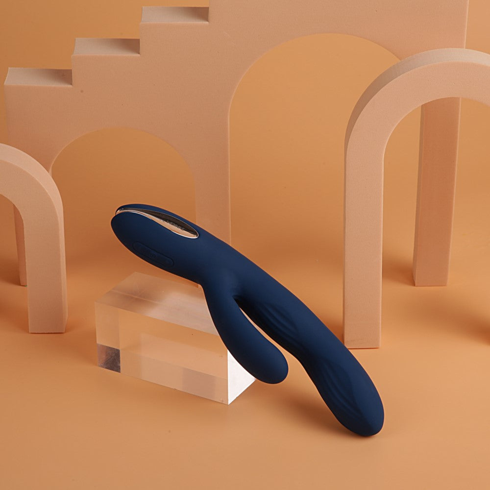 Aylin Powerful Pulsating Dual-Headed Rabbit Vibrator | Svakom (Dark Blue) with nude lifestyle backdrop