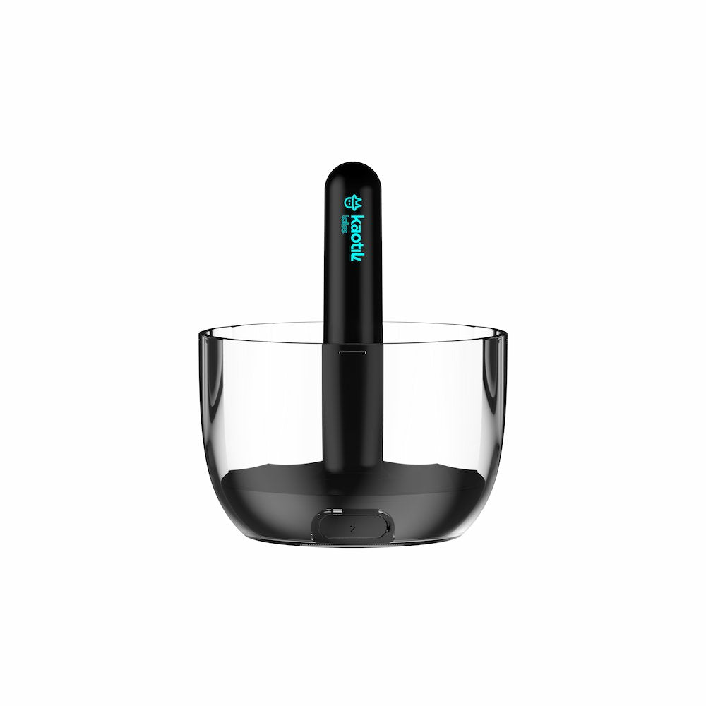 Front view of the transparent protective cap and black removable heating rod for Kaotik Labs The Cocoon Interactive Vibrating, Throbbing & Warming Masturbator on a white background.