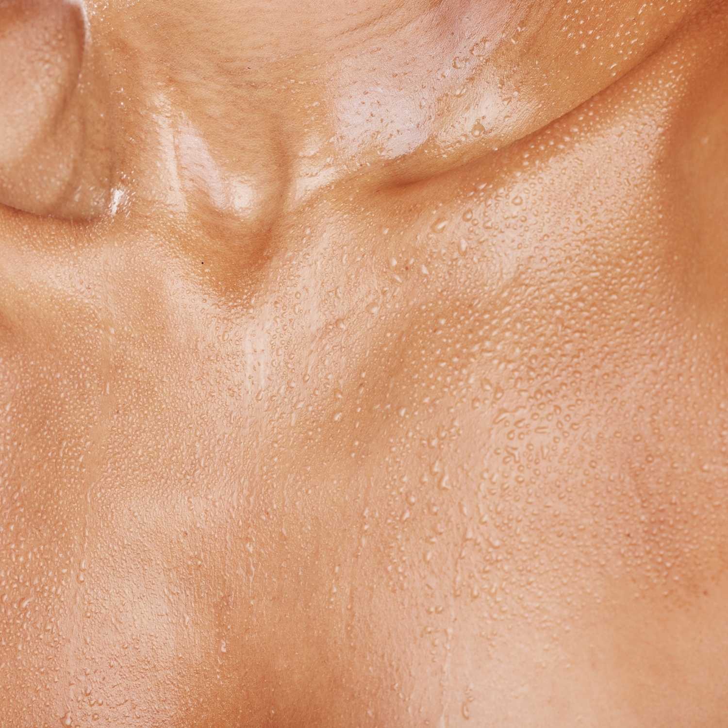Close-up of a woman's sweaty chest | OneNightOnly