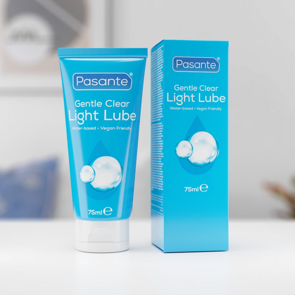 Front View Of Pasante Gentle Light Water-Based Lube Placed On White Table Next To Packaging
