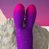 Rocks-Off | Glo Girl Bunny Flexible Waterproof Rabbit Vibrator Covered in Water Droplets