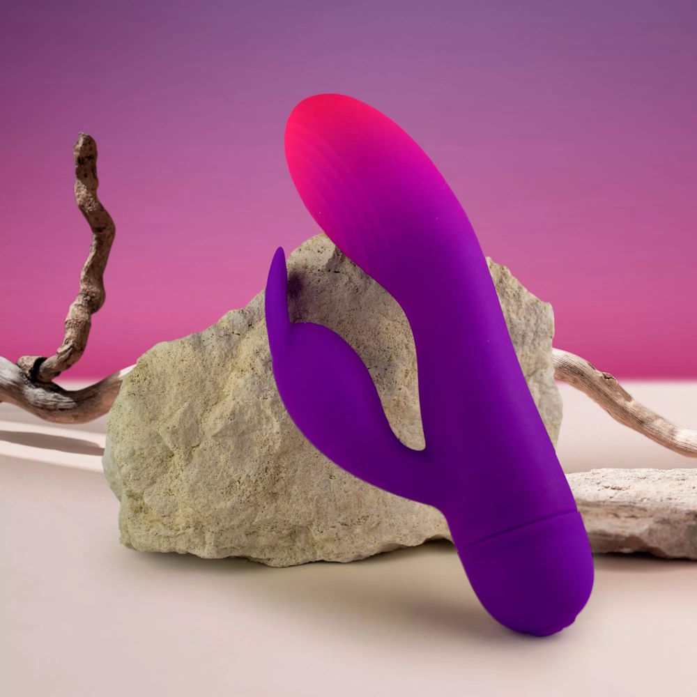 Rocks-Off | Glo Girl Rabbit Vibrator Leaning Against Rock