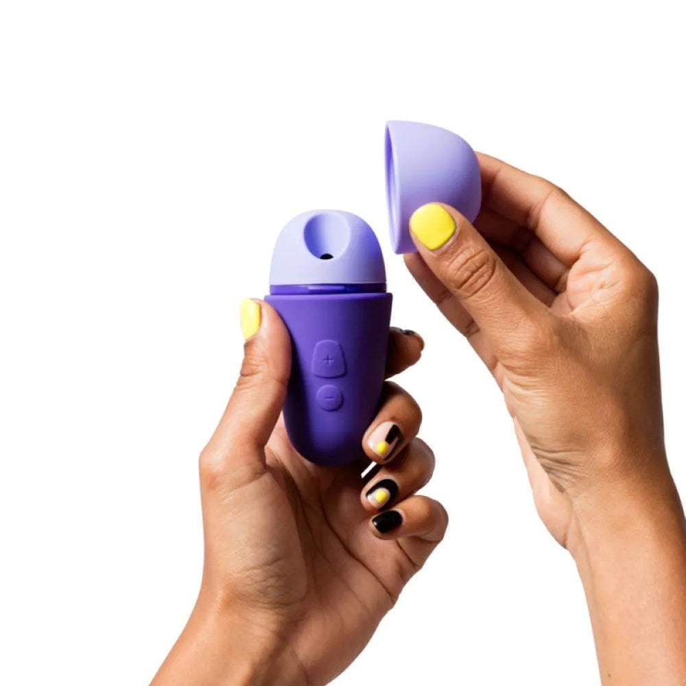 Romp | Free X Clitoral Suction Stimulator in Hand with Travel Lid Open