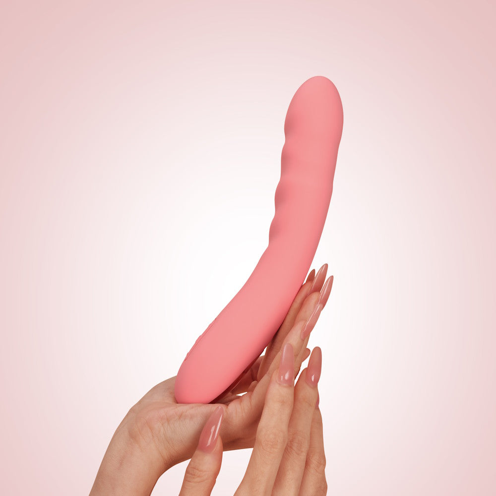 Svakom Ava Neo Interactive Thrusting Vibrator Peach Pink In Model's Hand