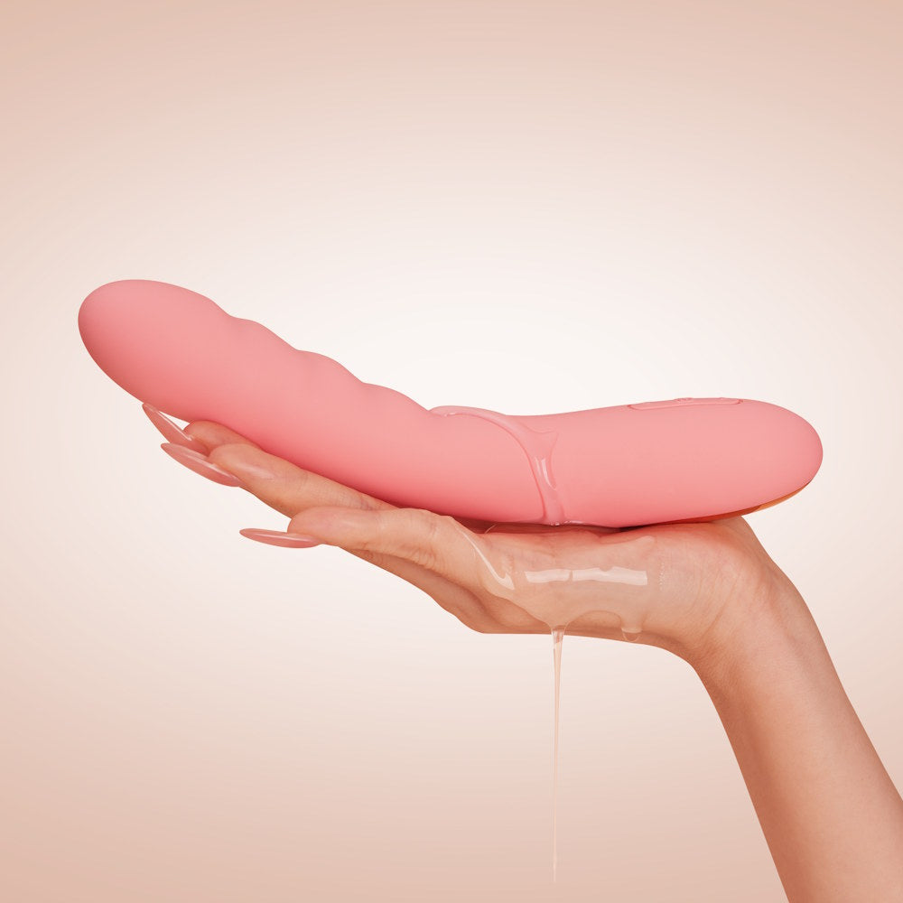 Svakom Ava Neo Interactive Thrusting Vibrator Peach Pink Covered in Lube