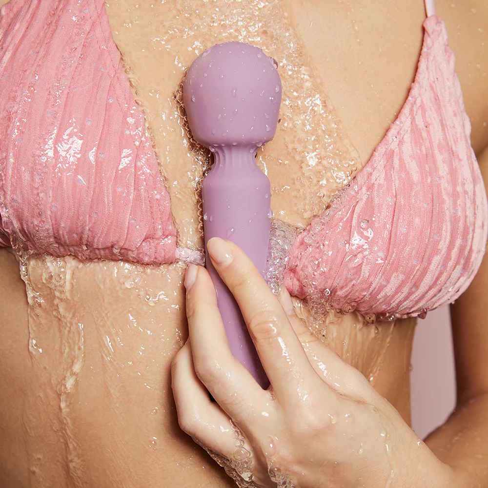 Svakom | Mini Emma Neo Interactive Waterproof Compact Wand Vibrator In Model's Hand