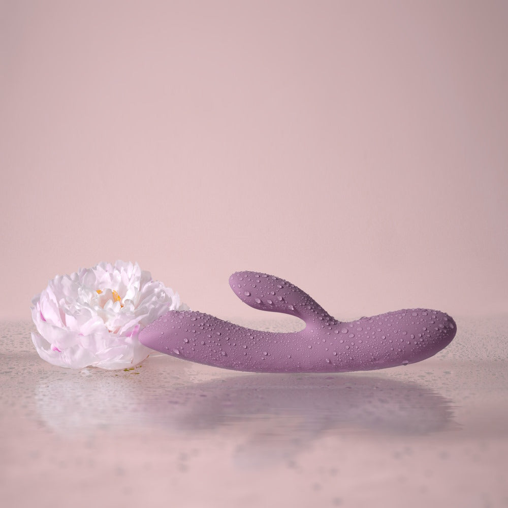 Svakom | Trysta Neo Interactive Rabbit Vibrator with G-Spot Ball Splashed with Water Next to Flower