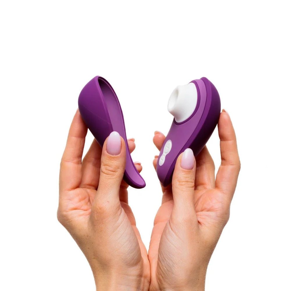Womanizer | Liberty 2 Pleasure Air Clitoral Suction Vibrator (Purple) in Model's Hand