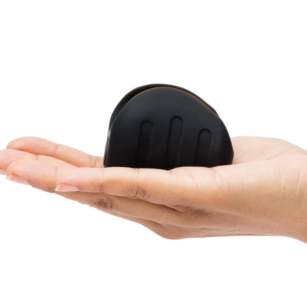 Side view of Sensation Vibrating Male Masturbator | Fifty Shades in hand