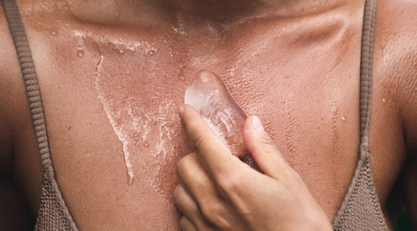 Model Rubbing Ice On Chest To Keep It Cool | OneNightOnly