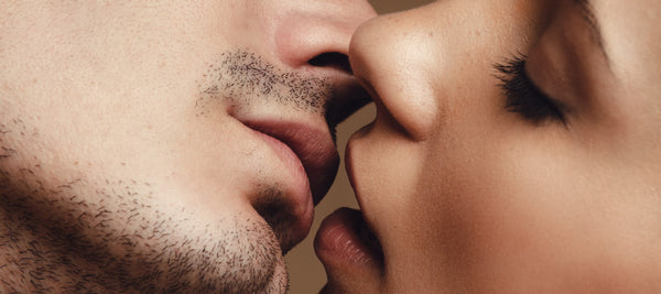 Male and female model close to kissing for New Years | OneNightOnly