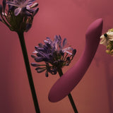 Amy 2 Flexible G-Spot Vibrator | Svakom (Violet) floating amongst flowers