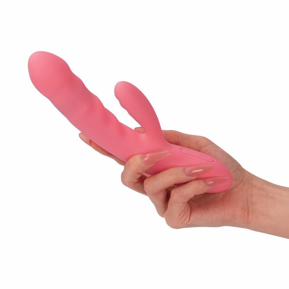 Hand Holding Avery Thrusting Rabbit Vibrator | Svakom - Strawberry Pink On White Background
