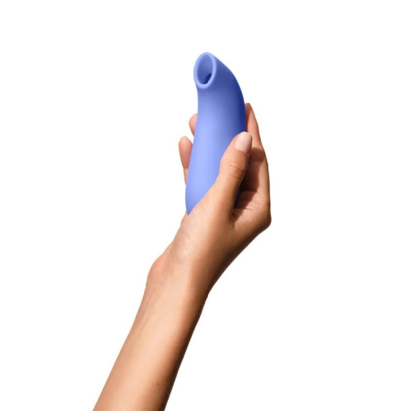 Dame | Aer Clitoral Suction Toy in hand