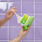 EasyToys | EasyGlide Toy Cleaning Wipes (25 Wipes) Being Pulled Out Of Packet In Models Hand 