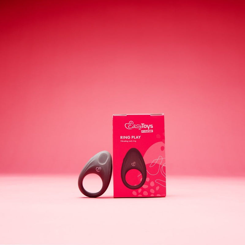 EasyToys | Ring Play Vibrating Cock Ring next to packaging