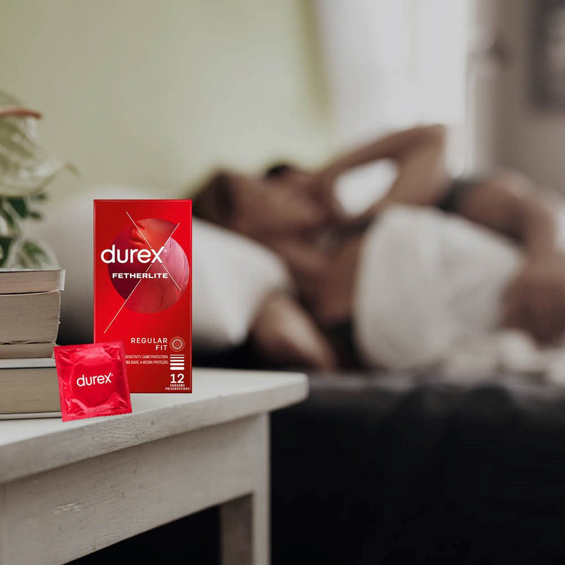 Fetherlite Condoms (Value Pack) | Durex on bedside table
