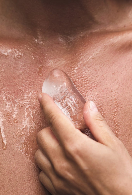 Model Rubbing Ice On Chest To Keep It Cool | OneNightOnly