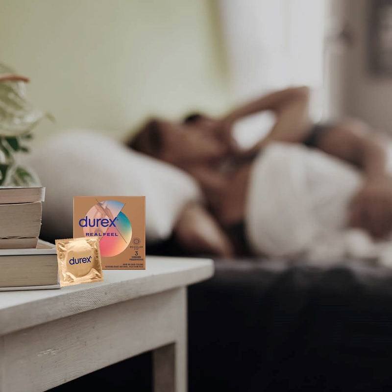 Real Feel Condoms | Durex (3s) on bedside table
