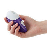 Romp | Free Clitoral Suction Vibrator in hand