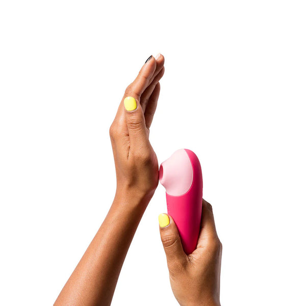 Romp Shine X Clitoral Suction Stimulator In Hand