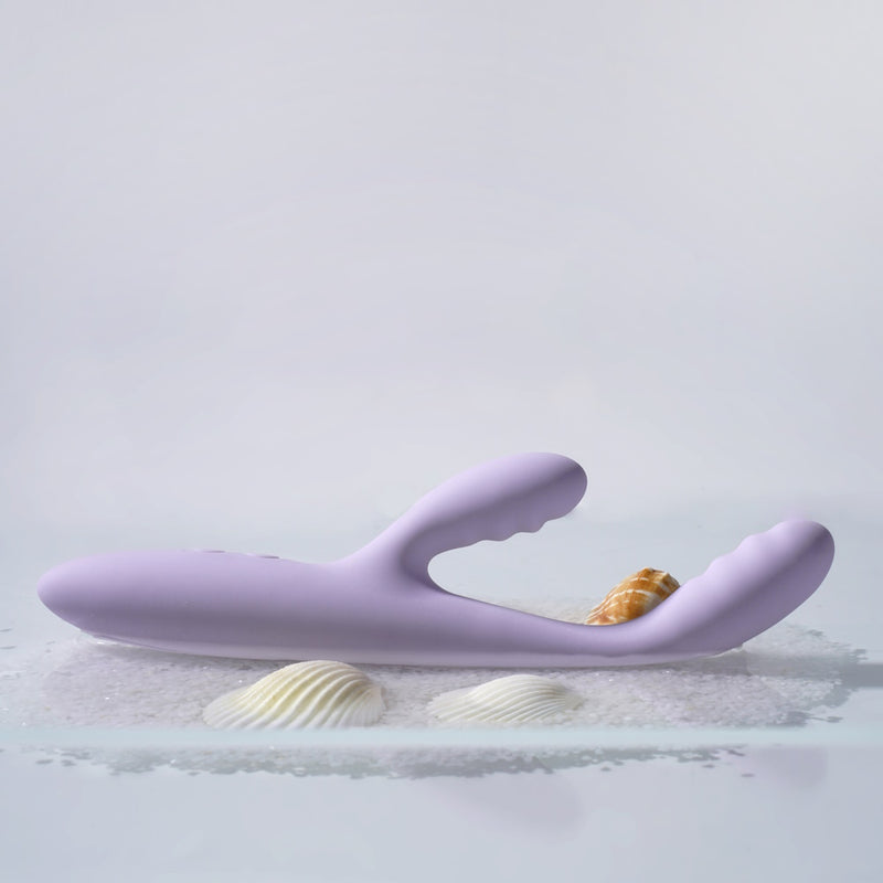 Svakom | Cici+ 2 App-Controlled Slim Rabbit Vibrator on Beach Sand with Shells