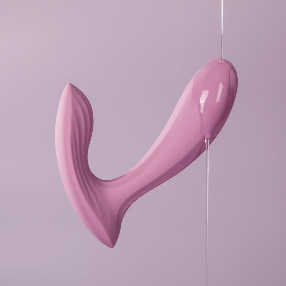 Svakom | Erica App-Controlled Wearable Vibrator & Anal Stimulator With Lube Dripping Onto the Tip
