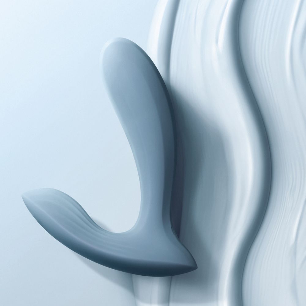 Side view of Svakom | Erica App-Controlled Wearable Vibrator & Anal Stimulator (Dusty Blue) on Blue Silk
