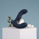 Svakom Iker Neo Interactive Pulsating Prostate & Perineum Vibrator Displayed With Flowers
