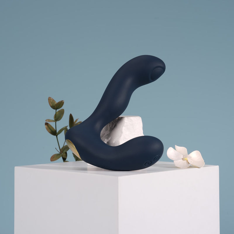 Svakom Iker Neo Interactive Pulsating Prostate & Perineum Vibrator Displayed With Flowers