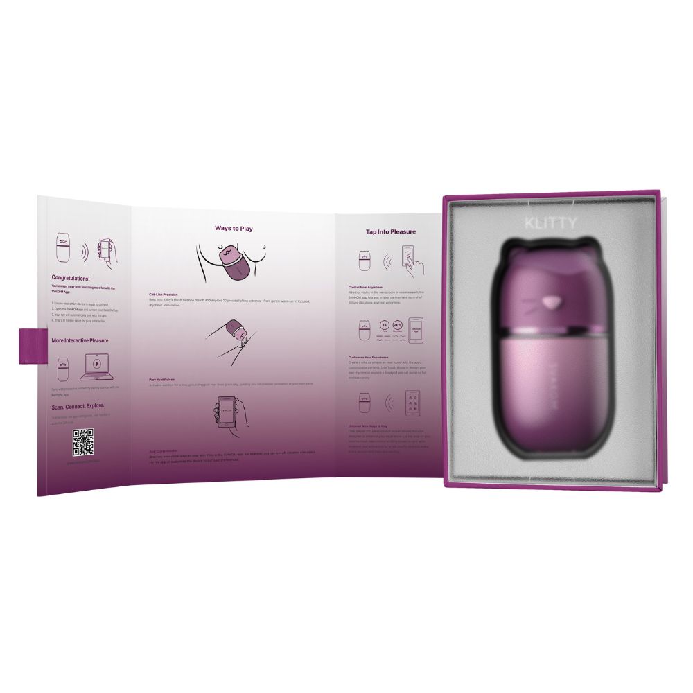 Open presentation box of the Svakom Klitty Interactive Licking, Sucking & Vibrating Clitoral Stimulator showing the inner packaging, instruction panels and the product displayed inside the tray.