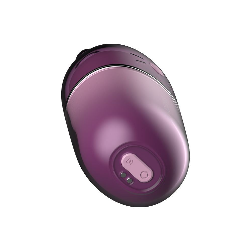 Angled underside view of the Svakom Klitty Interactive Licking, Sucking & Vibrating Clitoral Stimulator showing the base and charging area on a white background.