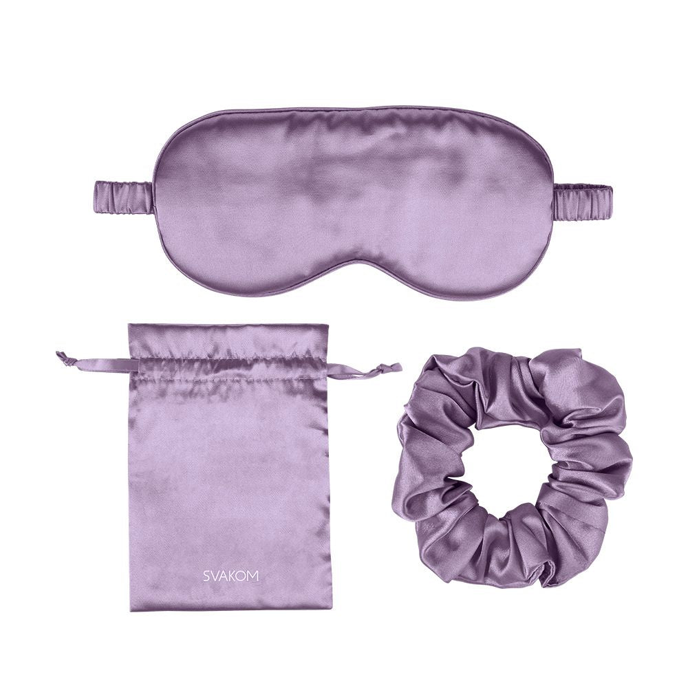 Violet Svakom Self-Love Kit featuring the satin sleep mask, matching satin storage pouch and satin scrunchie arranged together, set against a plain white background