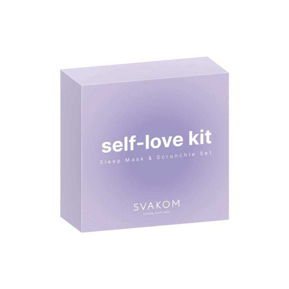 Front of the Violet Svakom Self-Love Kit gift box, featuring white 'self-love kit', 'Sleep Mask & Scrunchie Set' and 'SVAKOM' branding, set against a plain white background