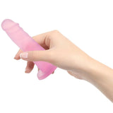 Swan Addiction | Cocktails 5.5 Inch Suction Cup Dildo (Purple Cosmo) in hand