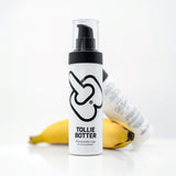 Tolliebotter | Personal Water-Based Lube (100ml) in front of a banana