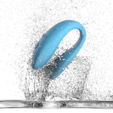 Waterproof We-Vibe | Sync Go Couples Vibrator (Turquoise) splashing in water