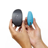 We-Vibe | Sync Go Couples Vibrator (Turquoise) in hand