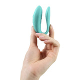 We-Vibe | Sync Lite Couples Vibrator (Aqua) in hand