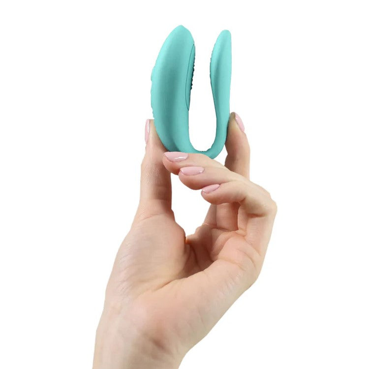 We-Vibe | Sync Lite Couples Vibrator (Aqua) in hand