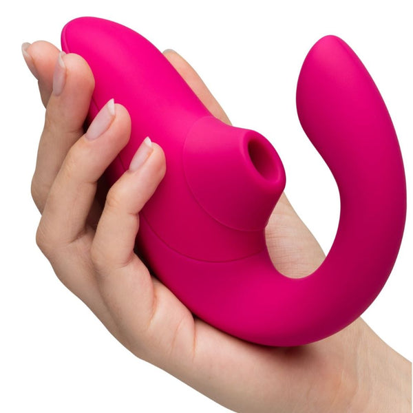 Womanizer | Blend Pleasure Air Rabbit Vibrator (Vibrant Pink) in hand