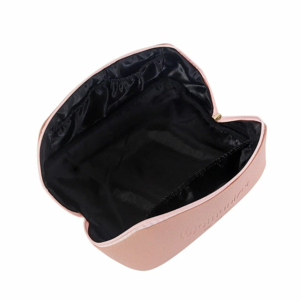 Interior view of the Womanizer Cosmetic Toy Bag with Zip & Carry Handle, showing the glossy black satin lining and three internal pockets for smaller accessories