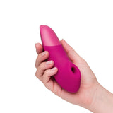 Womanizer | Enhance Clitoral Stimulator with Pleasure Air & Vibrations in Hand