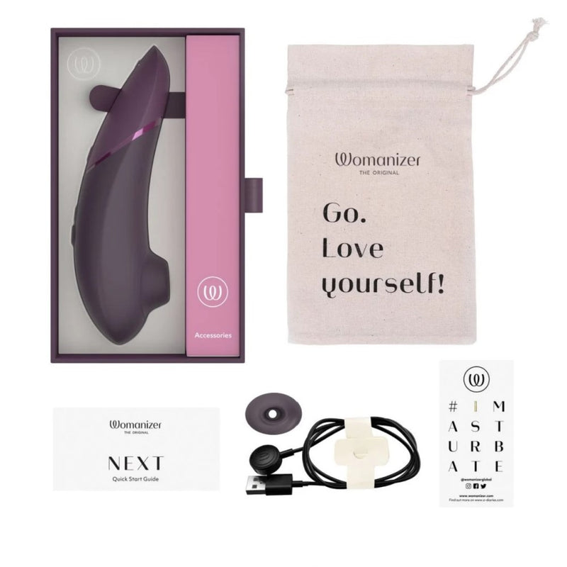 Box contents of the Womanizer | Next 3D Pleasure Air Clitoral Stimulator with Climax Control (Dark Purple)