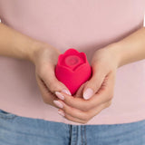 plusOne | Rose Pulsing Clitoral Arouser (Red) in woman's hands