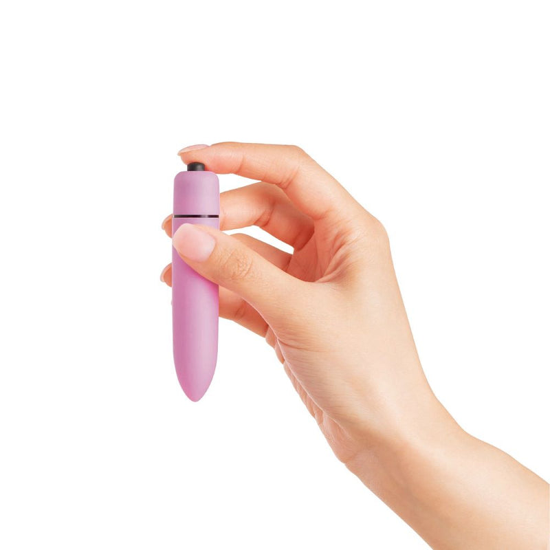 plusOne | Travel Bullet Vibrator (Pink) in hand