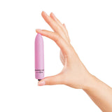 plusOne | Travel Bullet Vibrator (Pink) between fingers