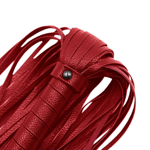 Close up view of Faux Leather Flogger | Adrien Lastic - Red